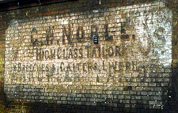 Advertisement on the side of the outbuilding 2013